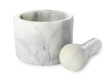 Photo of Marble mortar with pestle isolated on white