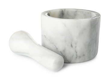 Photo of Marble mortar with pestle isolated on white