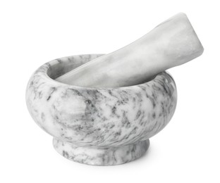 Photo of Marble mortar with pestle isolated on white