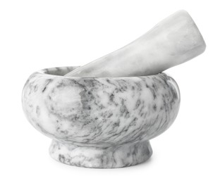 Photo of Marble mortar with pestle isolated on white