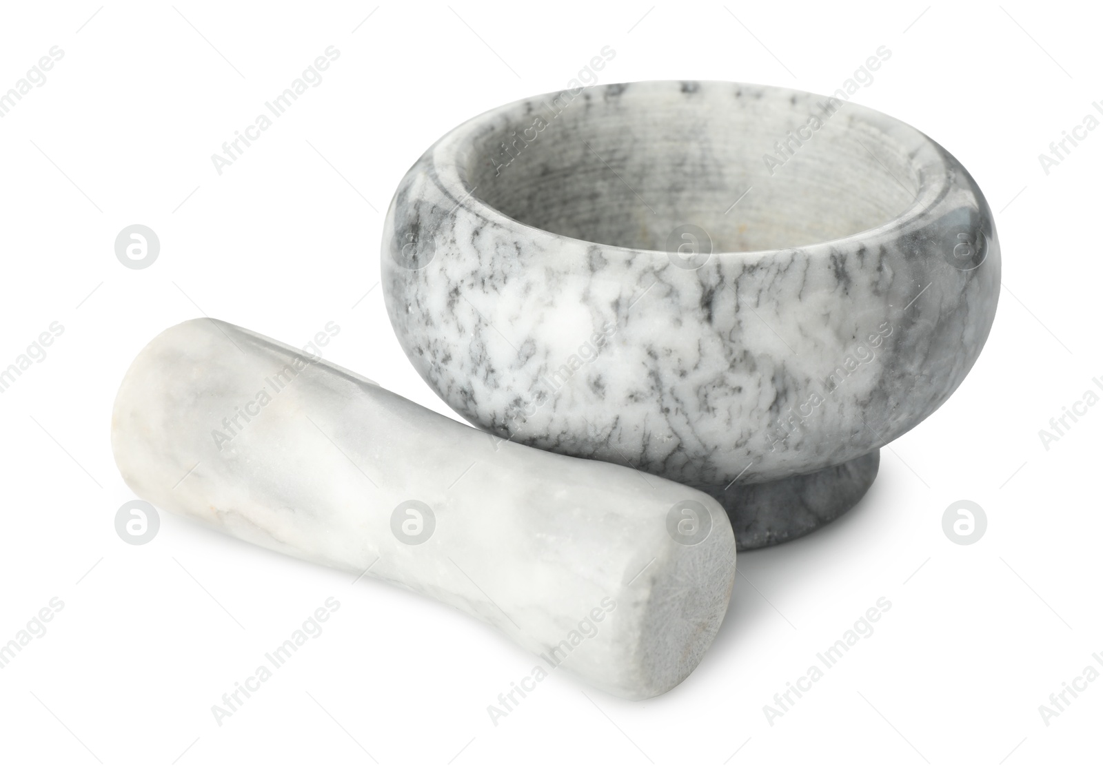 Marble mortar with pestle isolated on white Photo of Marble mortar with pestle isolated on white