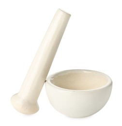 Photo of Ceramic mortar with pestle isolated on white