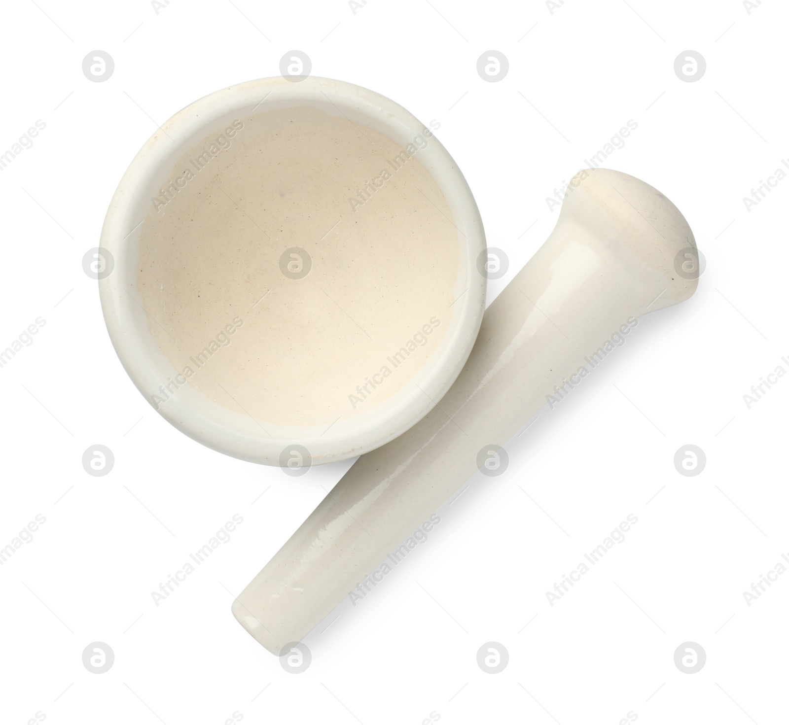 Ceramic mortar with pestle isolated on white, top view Photo of Ceramic mortar with pestle isolated on white, top view