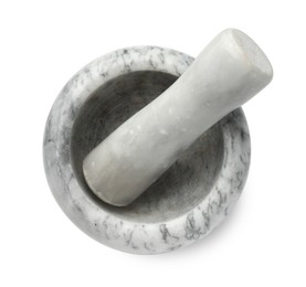 Photo of Marble mortar with pestle isolated on white, top view