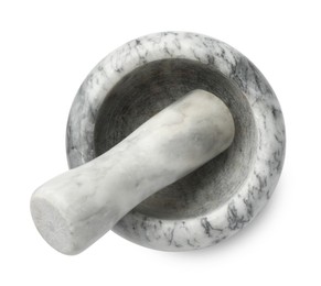 Photo of Marble mortar with pestle isolated on white, top view