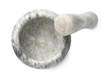Photo of Marble mortar with pestle isolated on white, top view