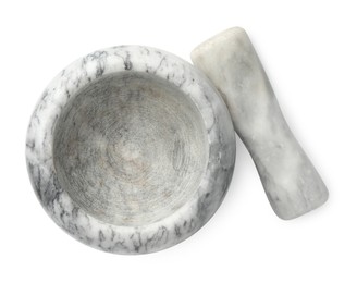 Photo of Marble mortar with pestle isolated on white, top view