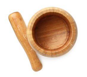 Photo of Wooden mortar with pestle isolated on white, top view