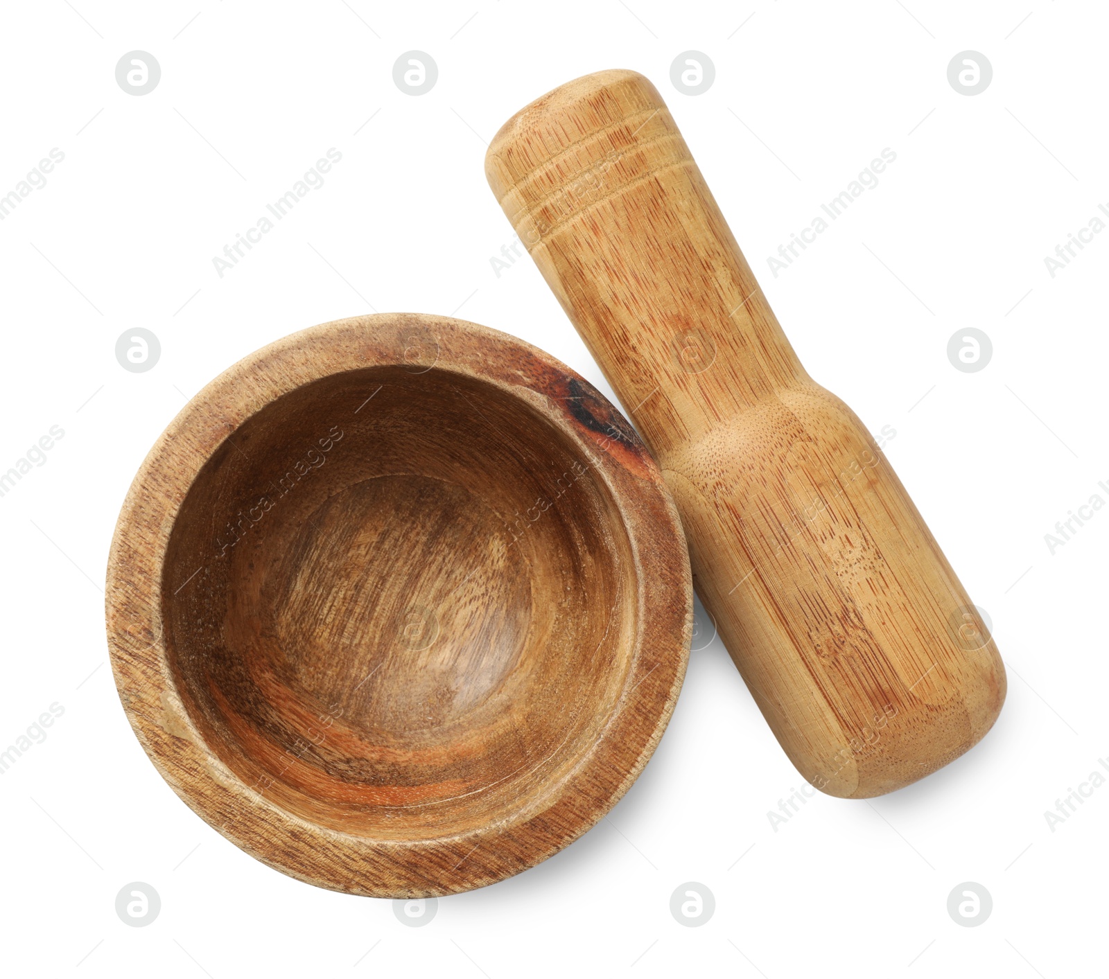 Wooden mortar with pestle isolated on white, top view Photo of Wooden mortar with pestle isolated on white, top view