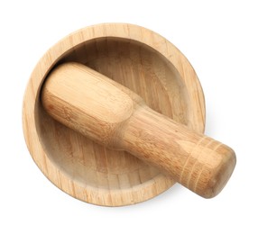 Photo of Wooden mortar with pestle isolated on white, top view
