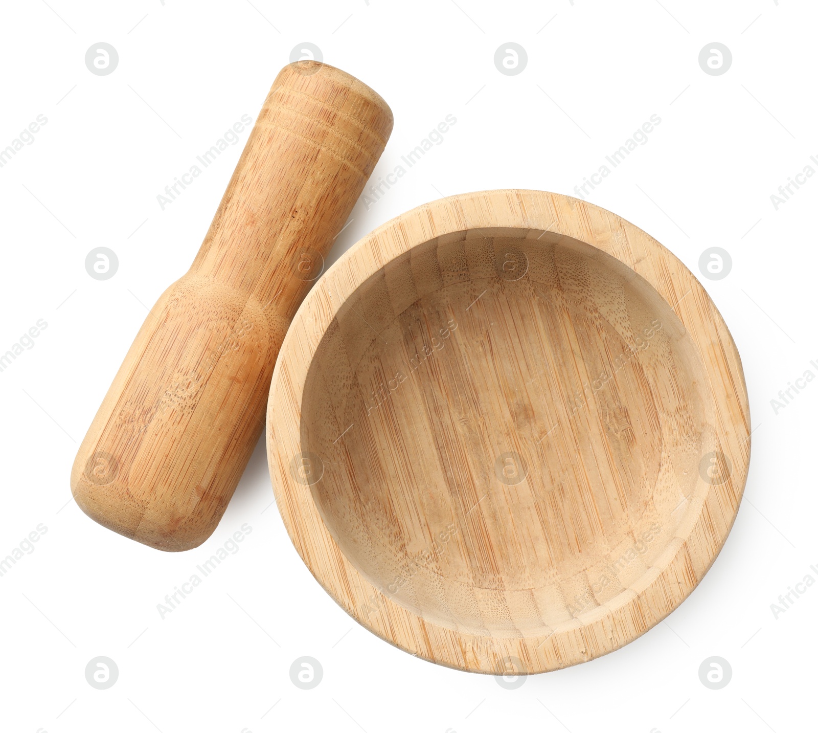 Wooden mortar with pestle isolated on white, top view Photo of Wooden mortar with pestle isolated on white, top view
