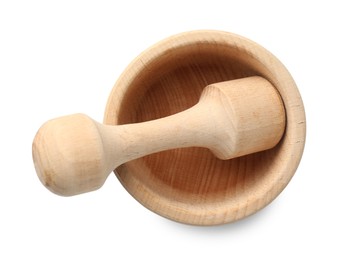 Photo of Wooden mortar with pestle isolated on white, top view