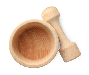 Photo of Wooden mortar with pestle isolated on white, top view