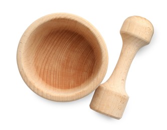 Photo of Wooden mortar with pestle isolated on white, top view