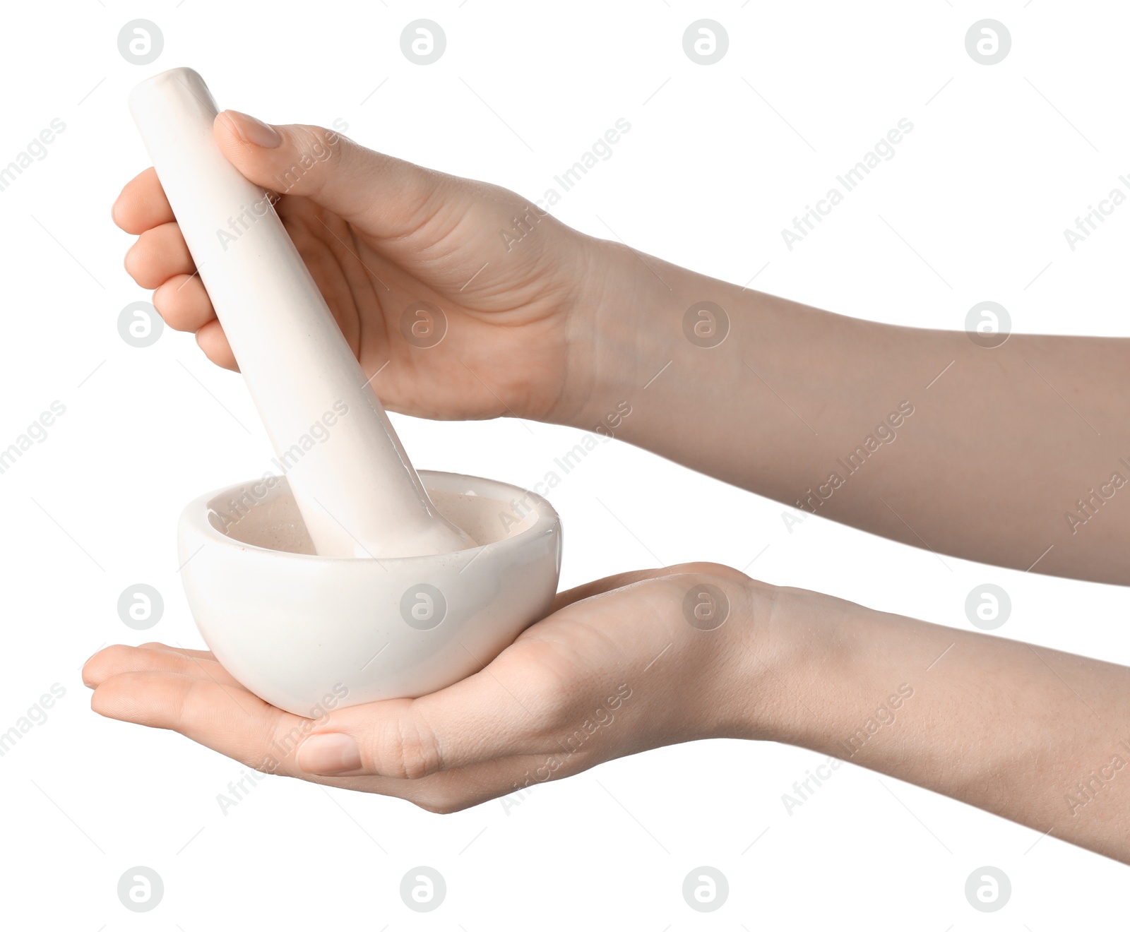 Woman with mortar and pestle on light background, closeup Photo of Woman with mortar and pestle on light background, closeup