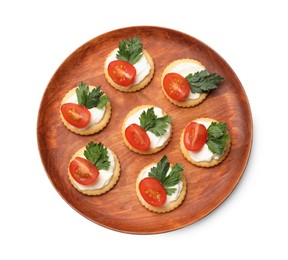 Photo of Tasty crackers with cream cheese, tomatoes and parsley isolated on white, top view