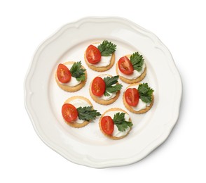 Photo of Tasty crackers with cream cheese, tomatoes and parsley isolated on white, top view