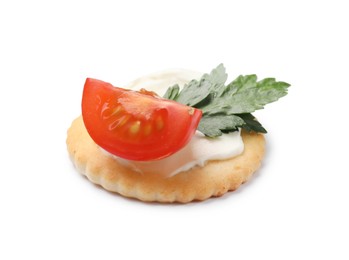 Photo of One tasty cracker with cream cheese, tomato and parsley isolated on white