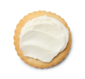 Photo of One tasty cracker with cream cheese isolated on white, top view