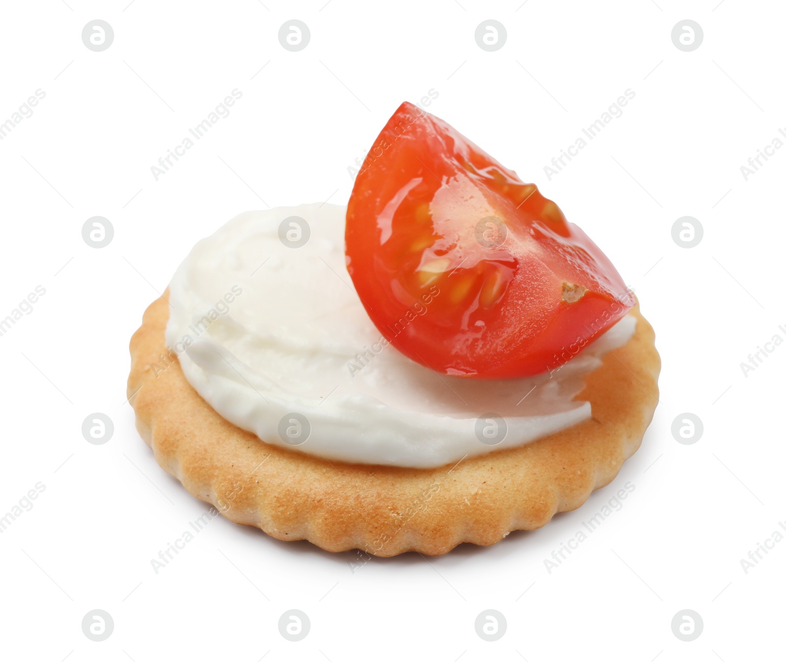 One tasty cracker with cream cheese and tomato isolated on white Photo of One tasty cracker with cream cheese and tomato isolated on white