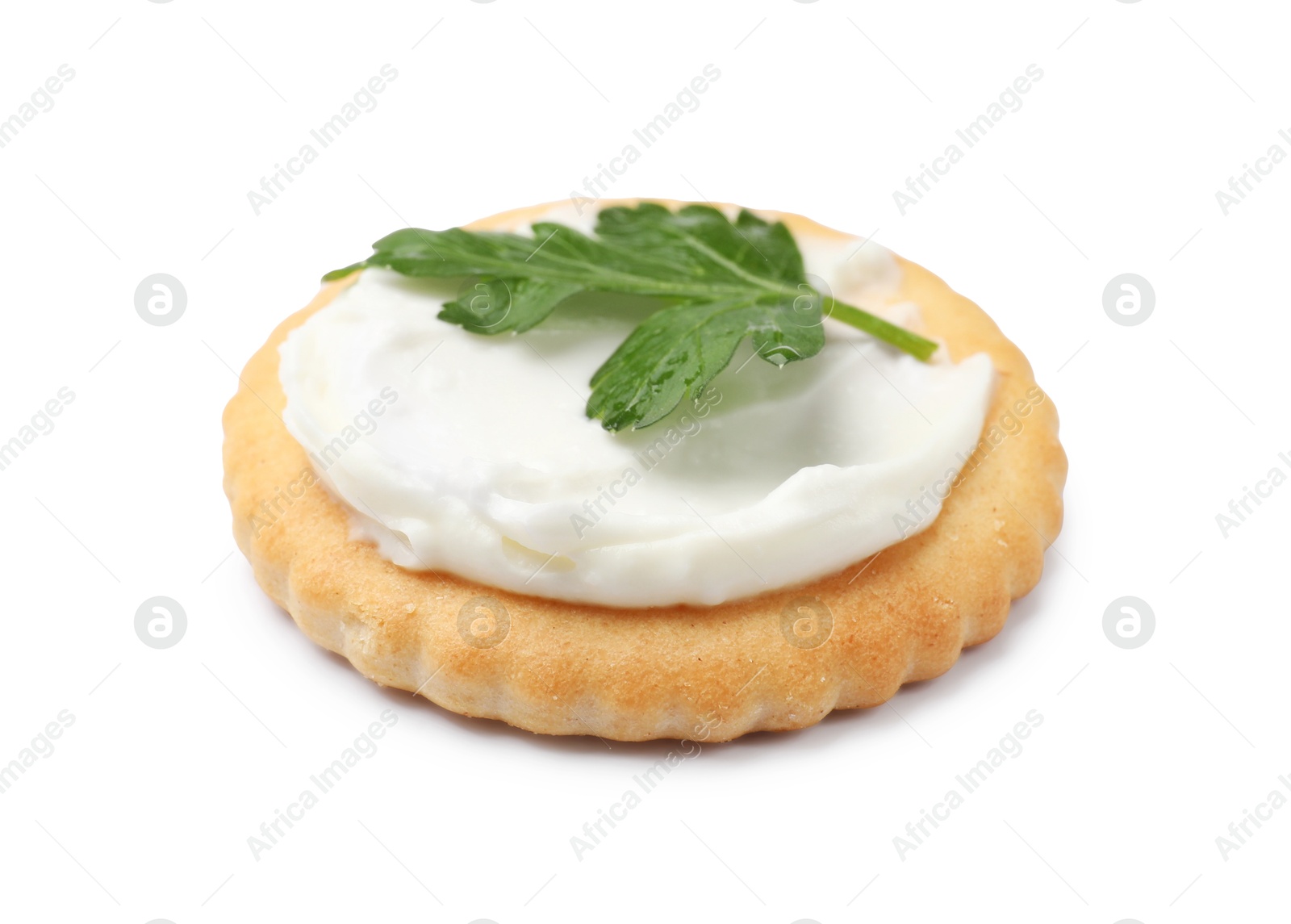 Photo of One tasty cracker with cream cheese and parsley isolated on white