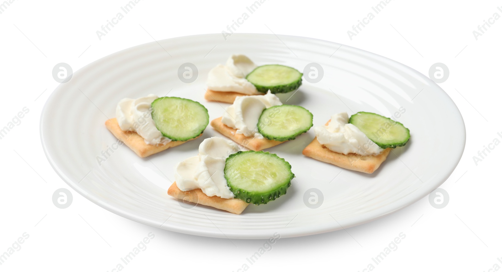 Tasty crackers with cream cheese and cucumber isolated on white Photo of Tasty crackers with cream cheese and cucumber isolated on white