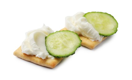 Photo of Tasty crackers with cream cheese and cucumber isolated on white