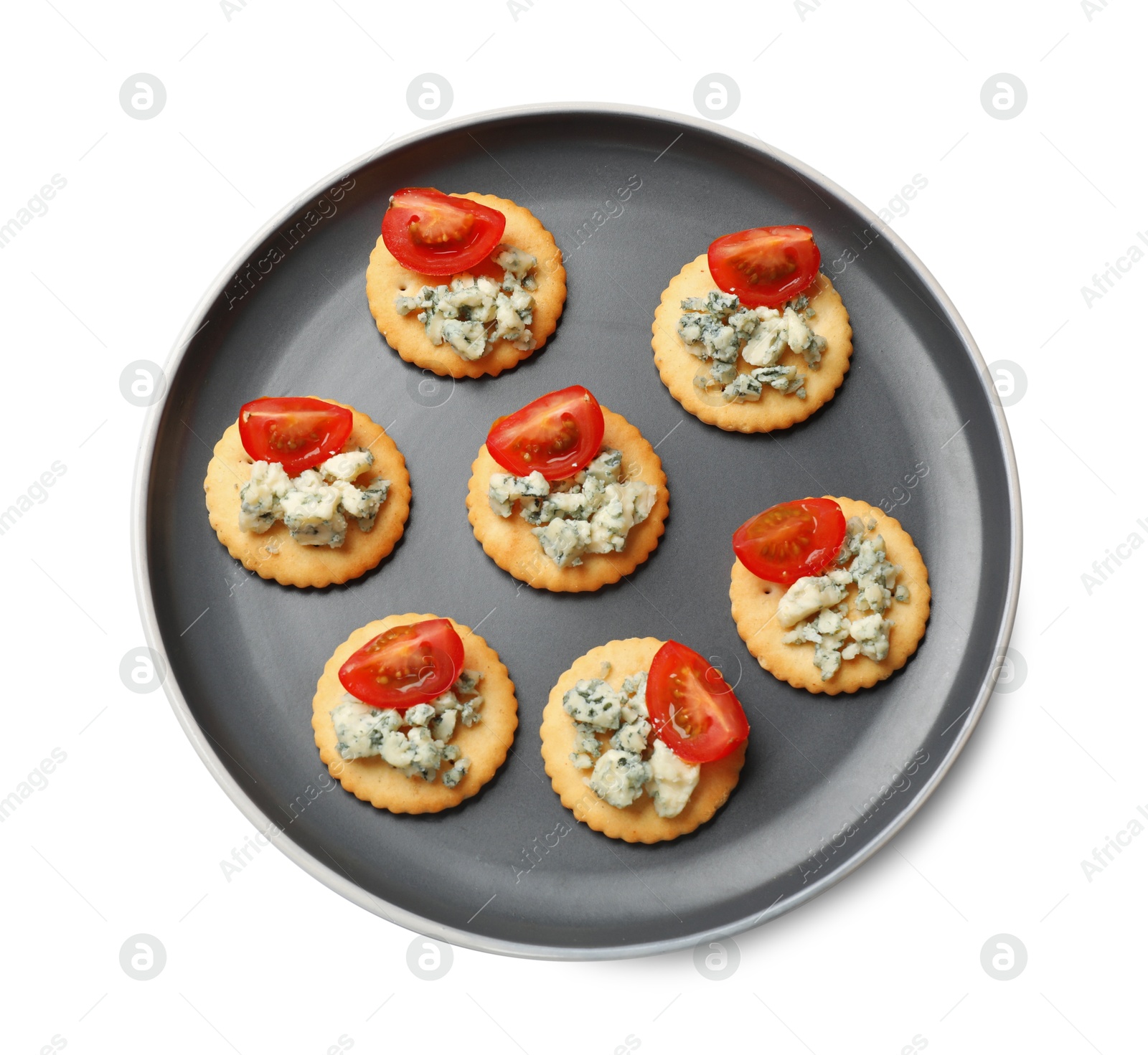 Tasty crackers with blue cheese and tomatoes isolated on white, top view Photo of Tasty crackers with blue cheese and tomatoes isolated on white, top view