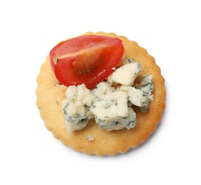 Photo of Tasty cracker with blue cheese and tomato isolated on white, top view