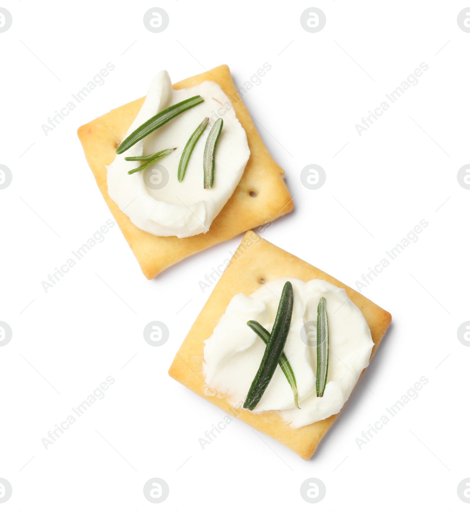 Tasty crackers with cream cheese and rosemary isolated on white, top view Photo of Tasty crackers with cream cheese and rosemary isolated on white, top view