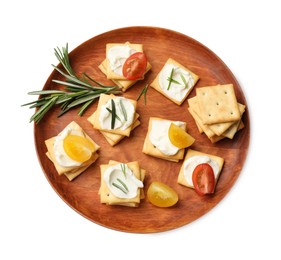 Photo of Tasty crackers with cream cheese, rosemary and tomatoes isolated on white, top view