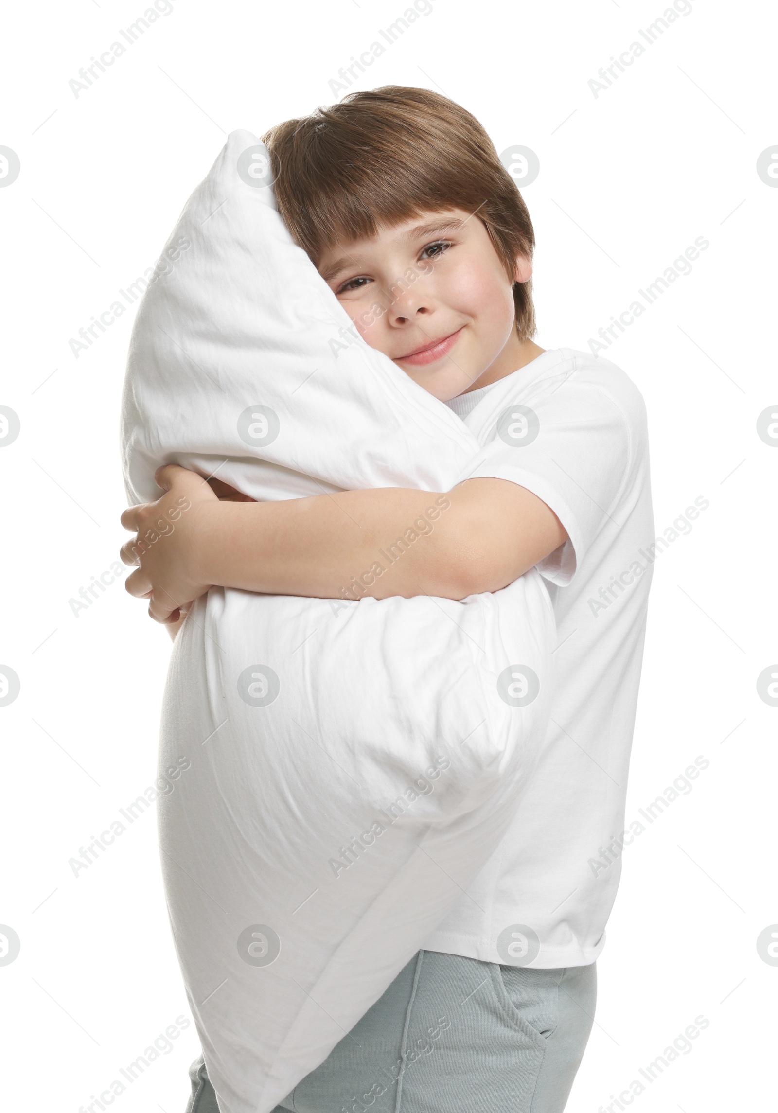 Photo of Cute boy with pillow on white background