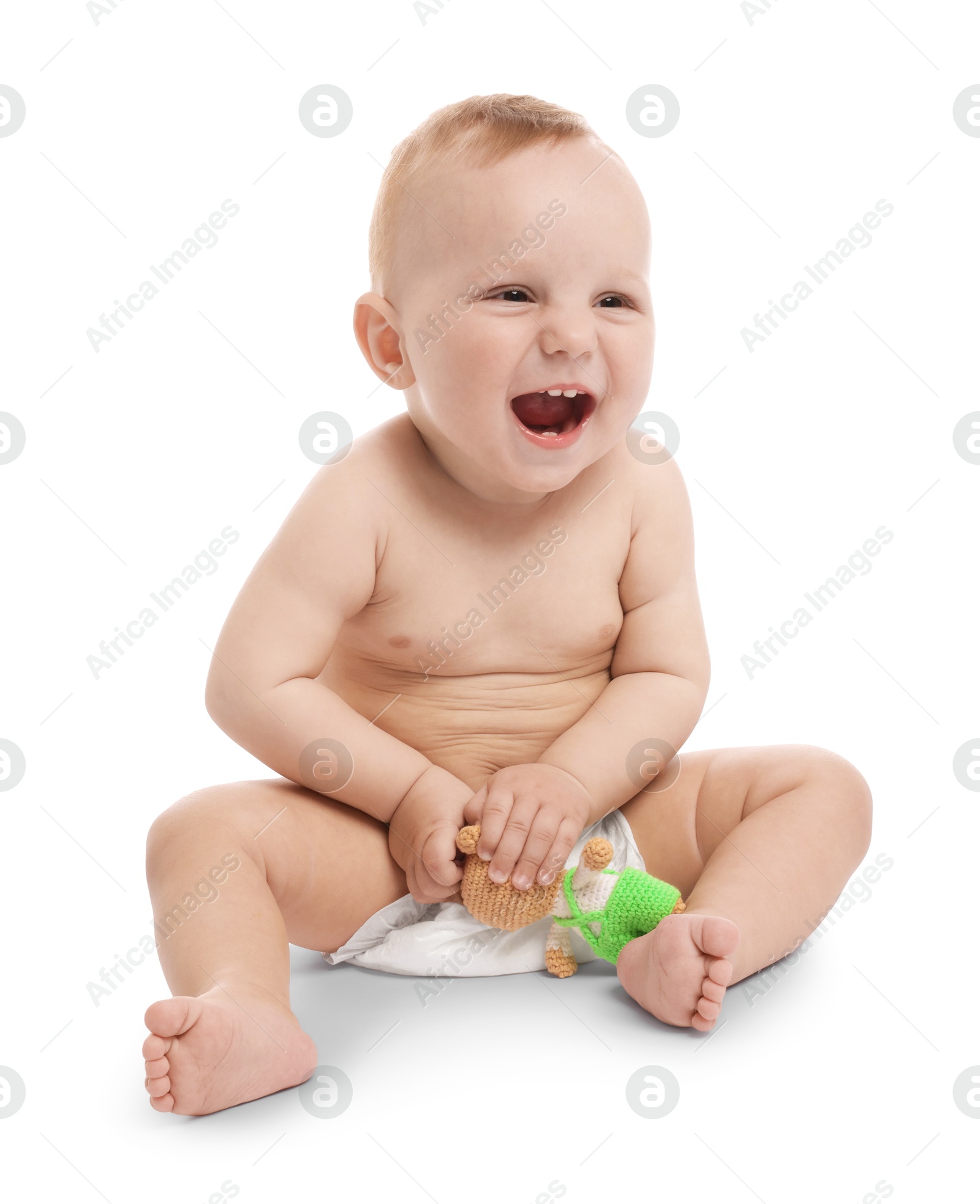 Cute little baby with toy on white background Photo of Cute little baby with toy on white background