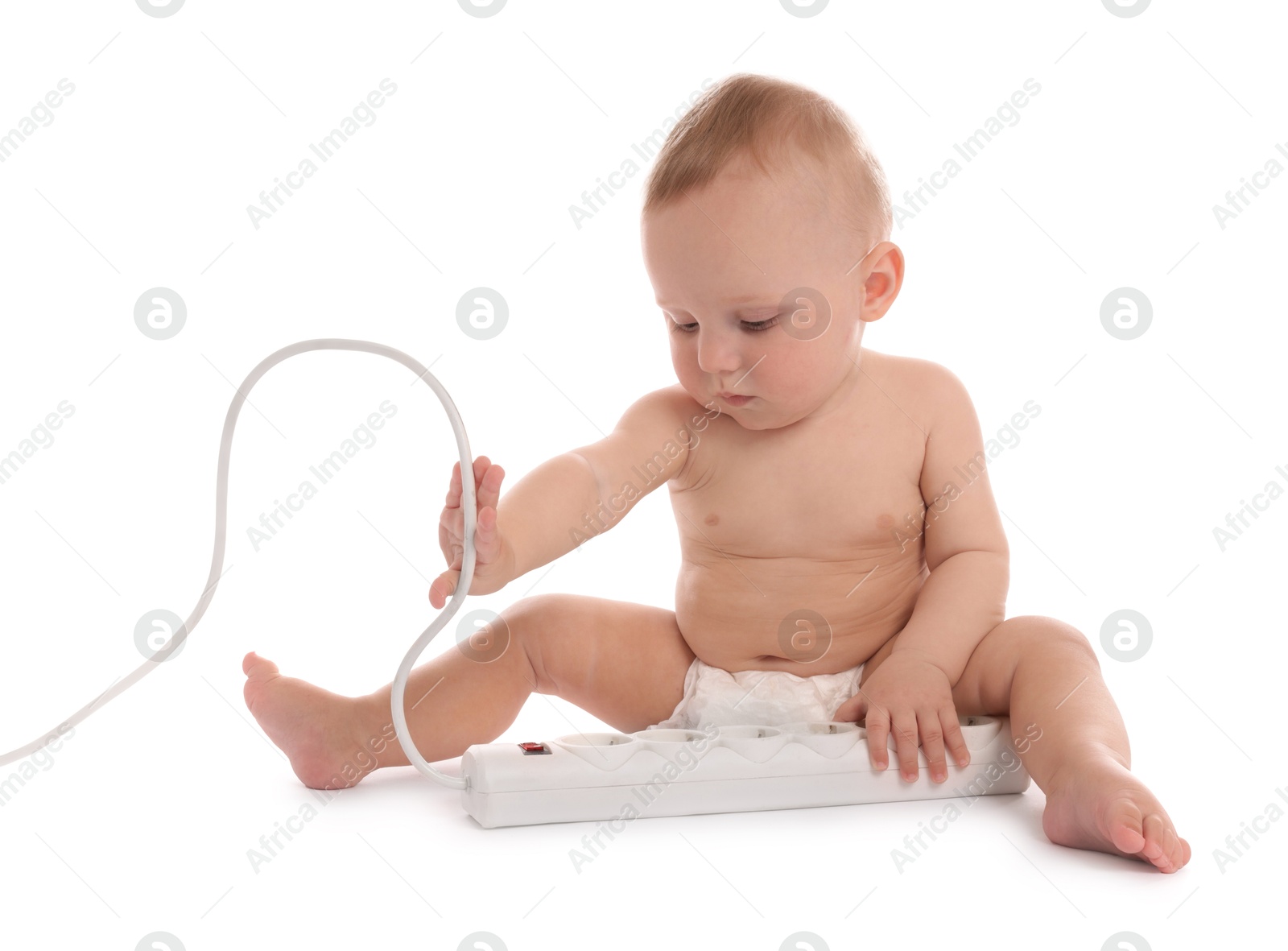 Cute little baby with extension cord on white background Photo of Cute little baby with extension cord on white background