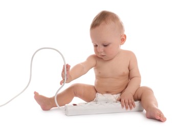 Photo of Cute little baby with extension cord on white background