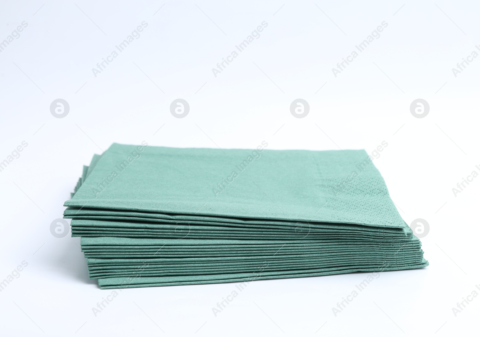 Many green paper handkerchiefs isolated on white Photo of Many green paper handkerchiefs isolated on white