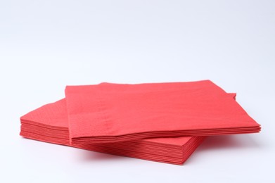 Photo of Many red paper handkerchiefs isolated on white