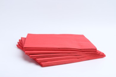 Photo of Many red paper handkerchiefs isolated on white