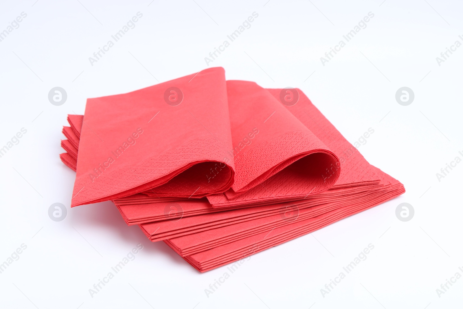 Many red paper handkerchiefs isolated on white Photo of Many red paper handkerchiefs isolated on white