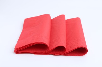Photo of Many red paper handkerchiefs isolated on white