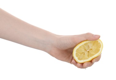 Photo of Woman squeezing lemon on white background, closeup