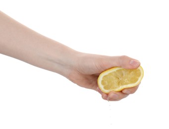 Photo of Woman squeezing lemon on white background, closeup