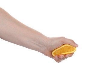 Photo of Woman squeezing orange on white background, closeup