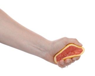 Photo of Woman squeezing grapefruit on white background, closeup