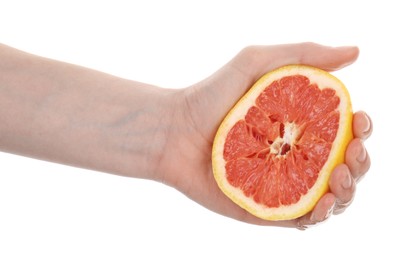 Photo of Woman squeezing grapefruit on white background, closeup