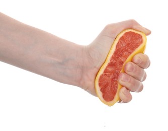 Photo of Woman squeezing grapefruit on white background, closeup