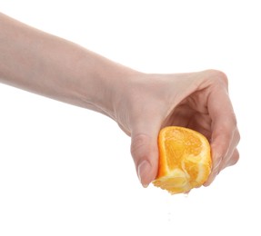 Photo of Woman squeezing orange on white background, closeup