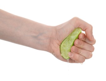 Photo of Woman squeezing lime on white background, closeup