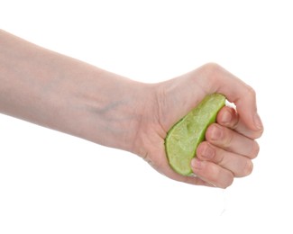 Photo of Woman squeezing lime on white background, closeup