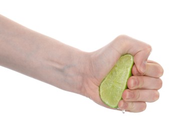 Photo of Woman squeezing lime on white background, closeup